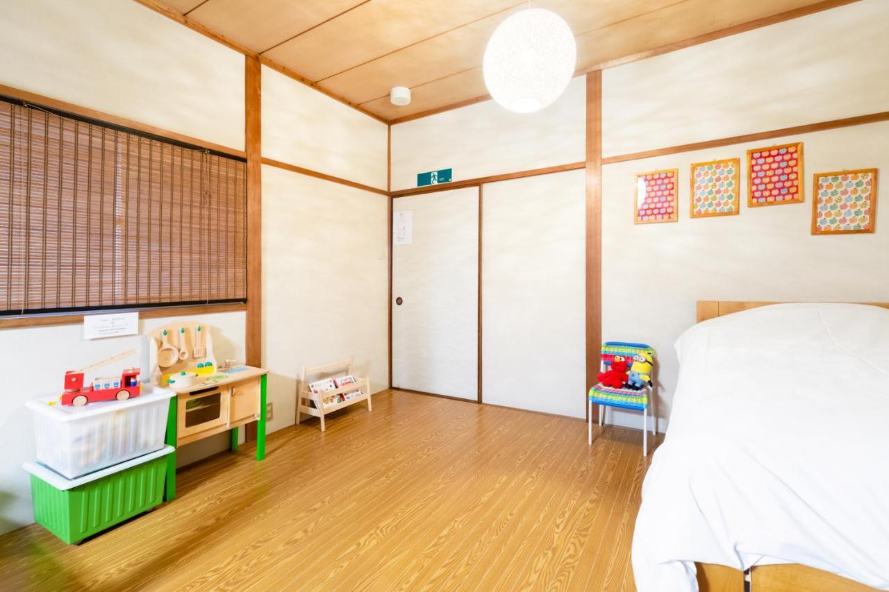 Chikyuutabikazoku Usj Apartment Osaka Exterior foto